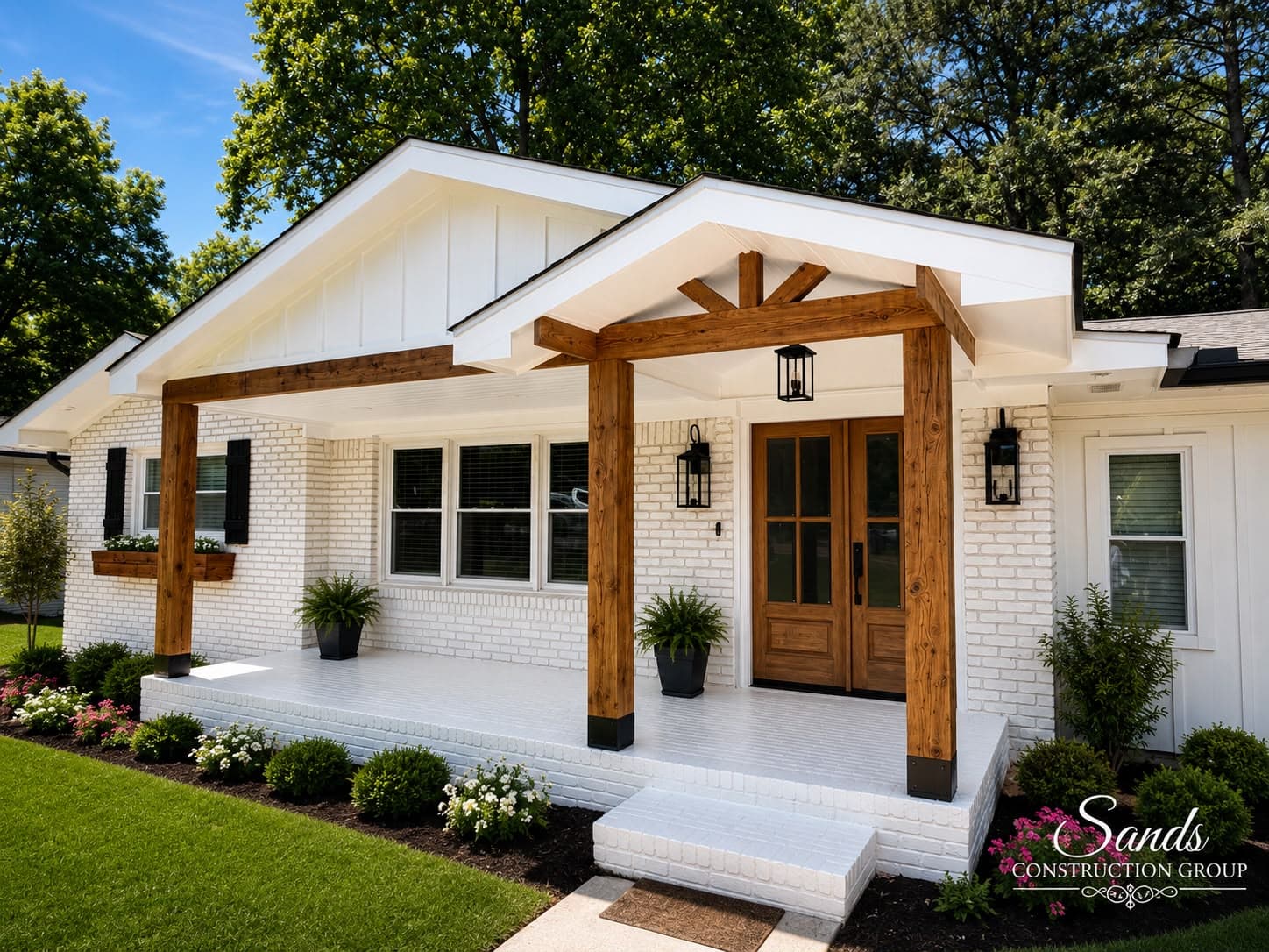 White brick home entry renovated with timber posts and double wood doors